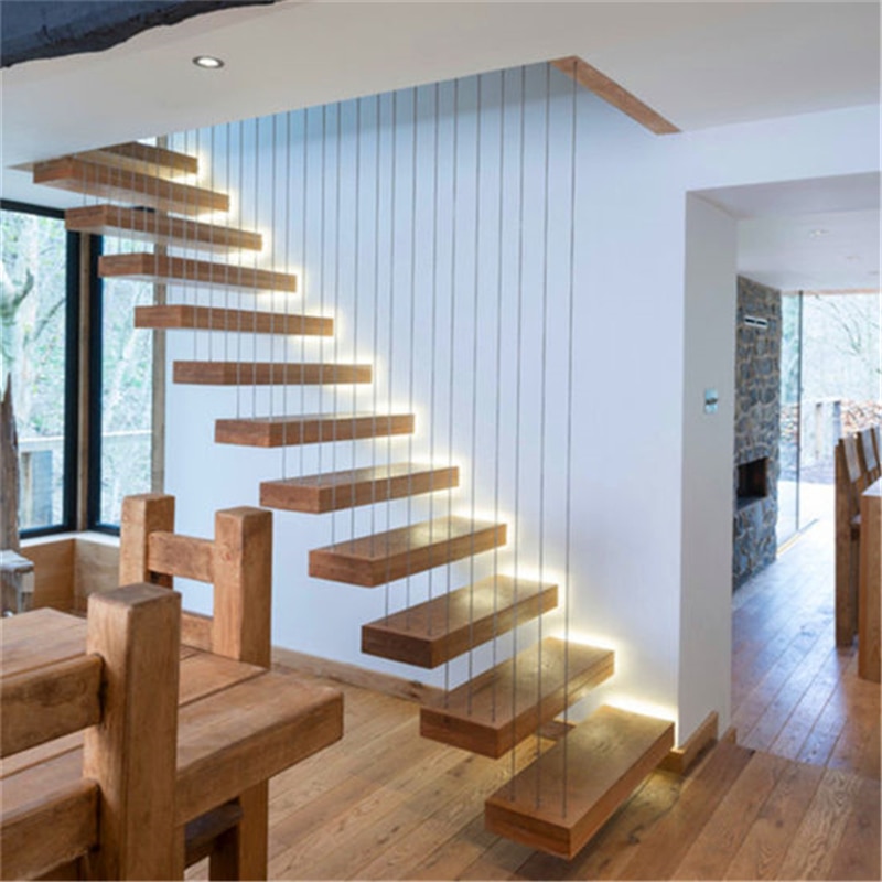 10+ mẫu cầu thang dọc phòng khách cho nhà ống đẹp nhất 2022